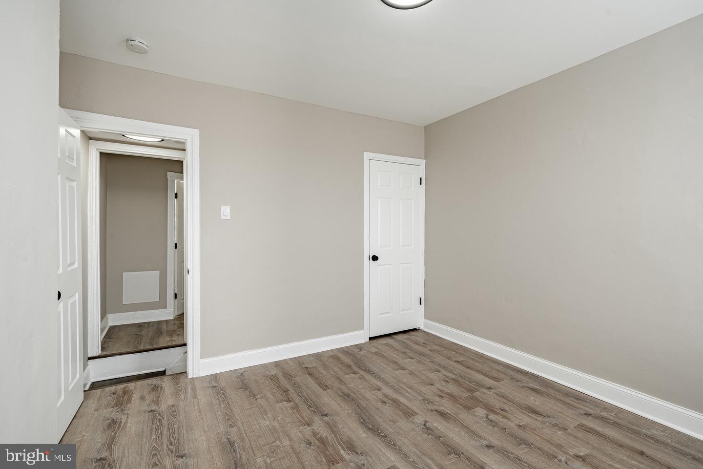 2113 North Philip Street Philadelphia, PA 19122 - Photo 14 of 22 Spacious room with neutral tones and light.