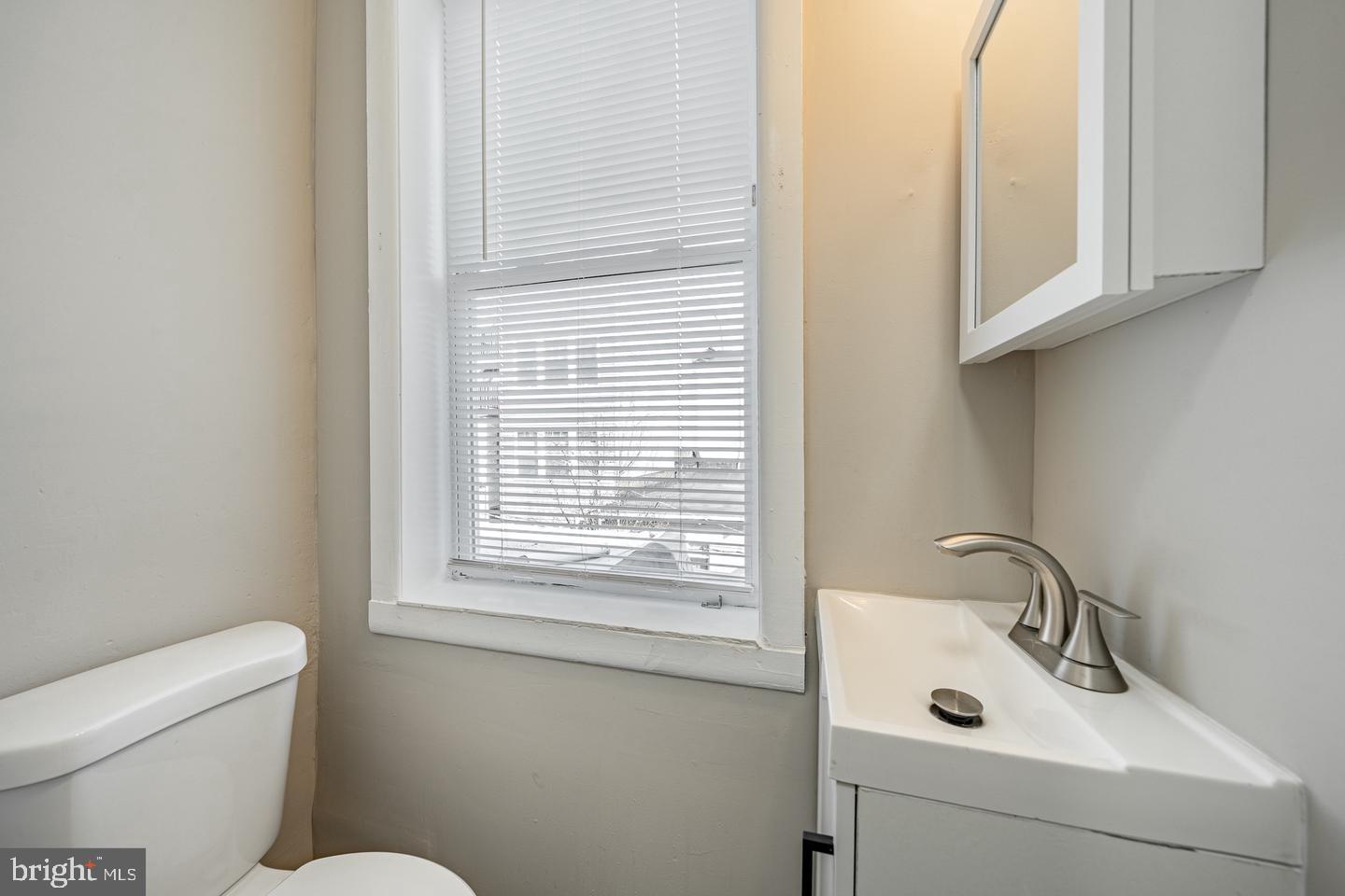 2113 North Philip Street Philadelphia, PA 19122 - Photo 18 of 22 Bright and airy bathroom with modern fixtures.