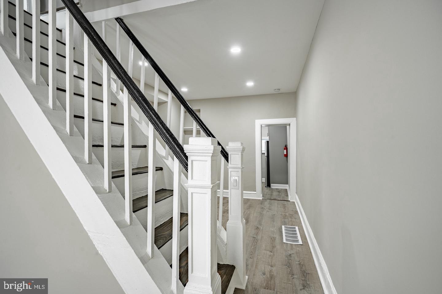 2113 North Philip Street Philadelphia, PA 19122 - Photo 5 of 22 Inviting entryway with elegant staircase.