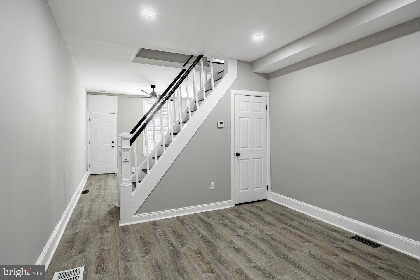 2113 North Philip Street Philadelphia, PA 19122 - Photo 7 of 22 Modern entryway with sleek staircase design.