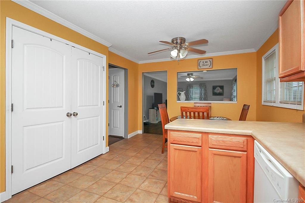 561 South Potter Road Lancaster, SC 29720 - Photo 11 of 33 a room with chandelier fan and windows