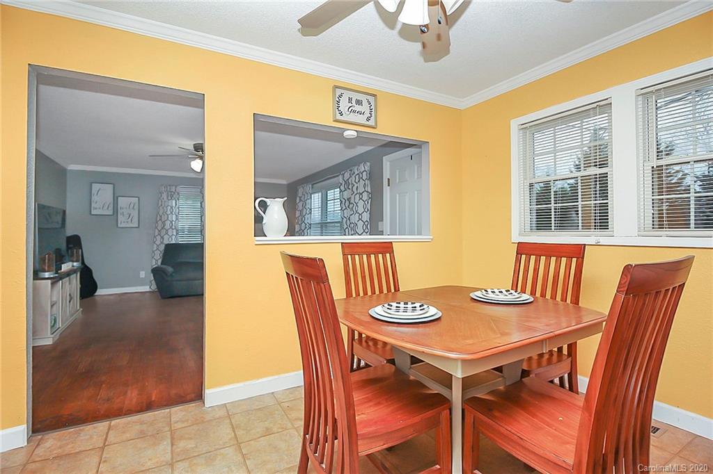 561 South Potter Road Lancaster, SC 29720 - Photo 14 of 33 a view of a dining room with furniture window and wooden floor