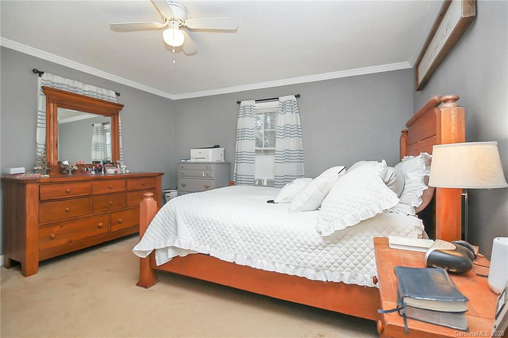 561 South Potter Road Lancaster, SC 29720 - Photo 19 of 33 a bedroom with a bed and a dresser