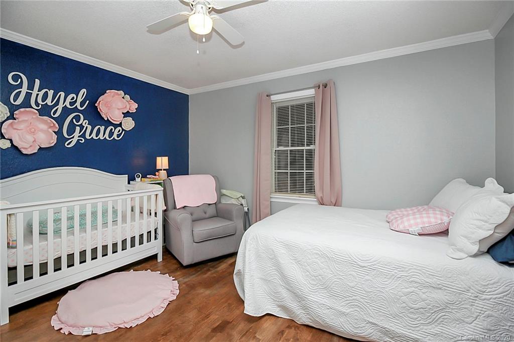 561 South Potter Road Lancaster, SC 29720 - Photo 21 of 33 a bedroom with a bed and a window
