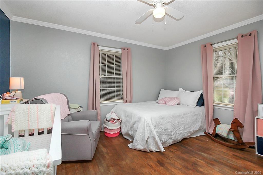 561 South Potter Road Lancaster, SC 29720 - Photo 22 of 33 a bedroom with a bed and a window