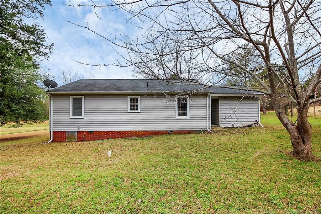 561 South Potter Road Lancaster, SC 29720 - Photo 27 of 33 a house that has a tree in front of it