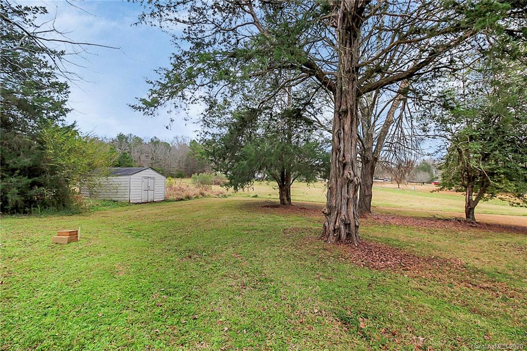 561 South Potter Road Lancaster, SC 29720 - Photo 28 of 33 a big yard with lots of green space and trees