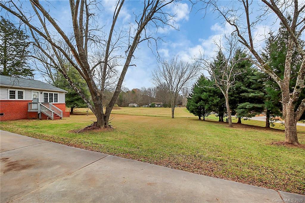 561 South Potter Road Lancaster, SC 29720 - Photo 30 of 33 a view of a house with backyard and tree
