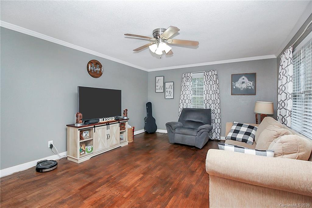 561 South Potter Road Lancaster, SC 29720 - Photo 4 of 33 a living room with furniture and a flat screen tv