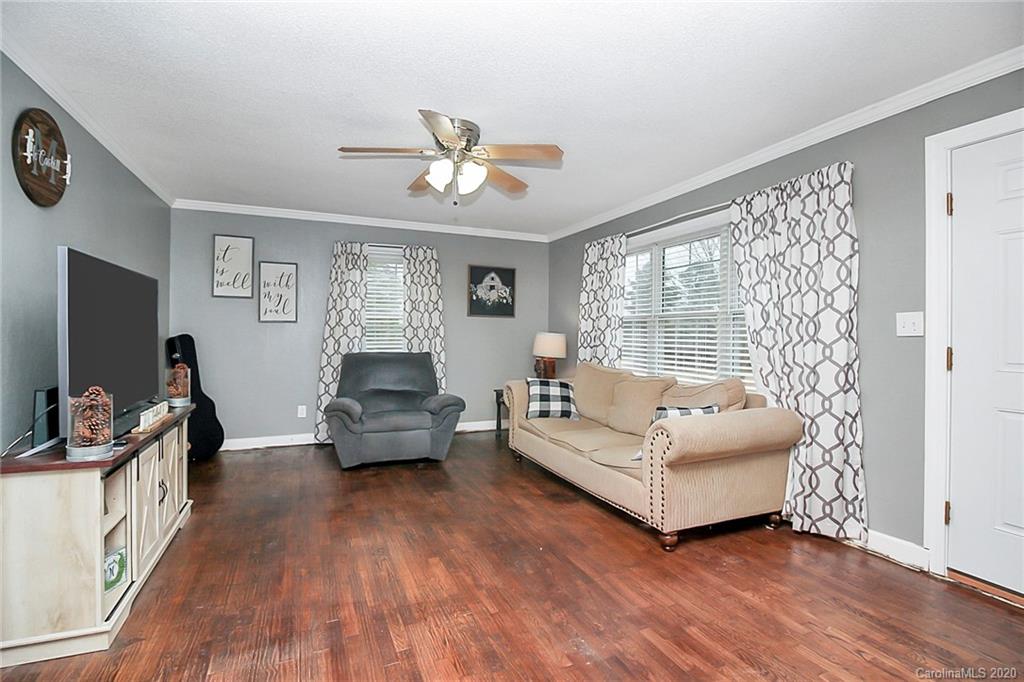 561 South Potter Road Lancaster, SC 29720 - Photo 5 of 33 a living room with furniture and a flat screen tv