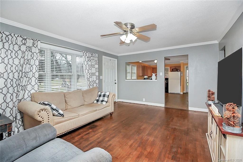 561 South Potter Road Lancaster, SC 29720 - Photo 6 of 33 a living room with furniture and a flat screen tv
