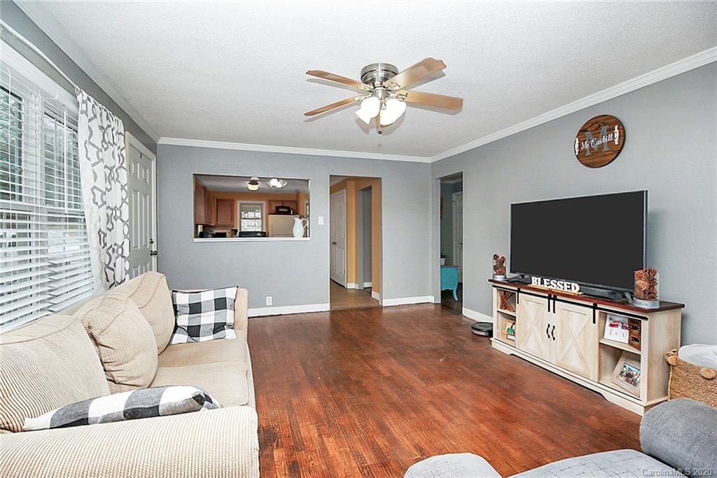 561 South Potter Road Lancaster, SC 29720 - Photo 7 of 33 a living room with furniture and a flat screen tv