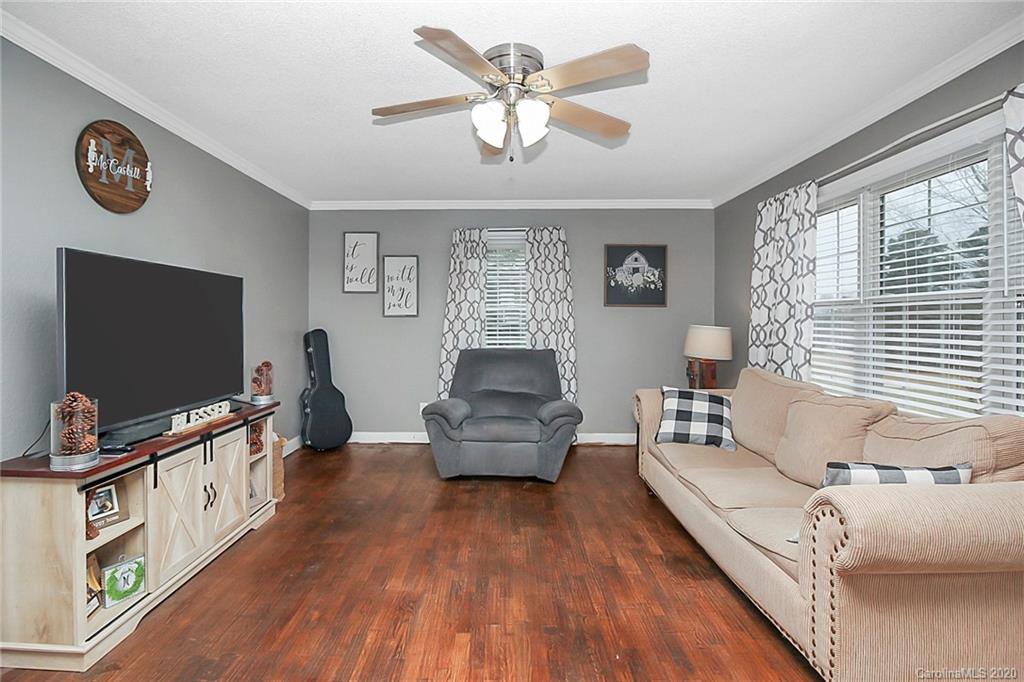 561 South Potter Road Lancaster, SC 29720 - Photo 8 of 33 a living room with furniture and a flat screen tv