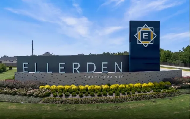 a view of a brick building with many windows