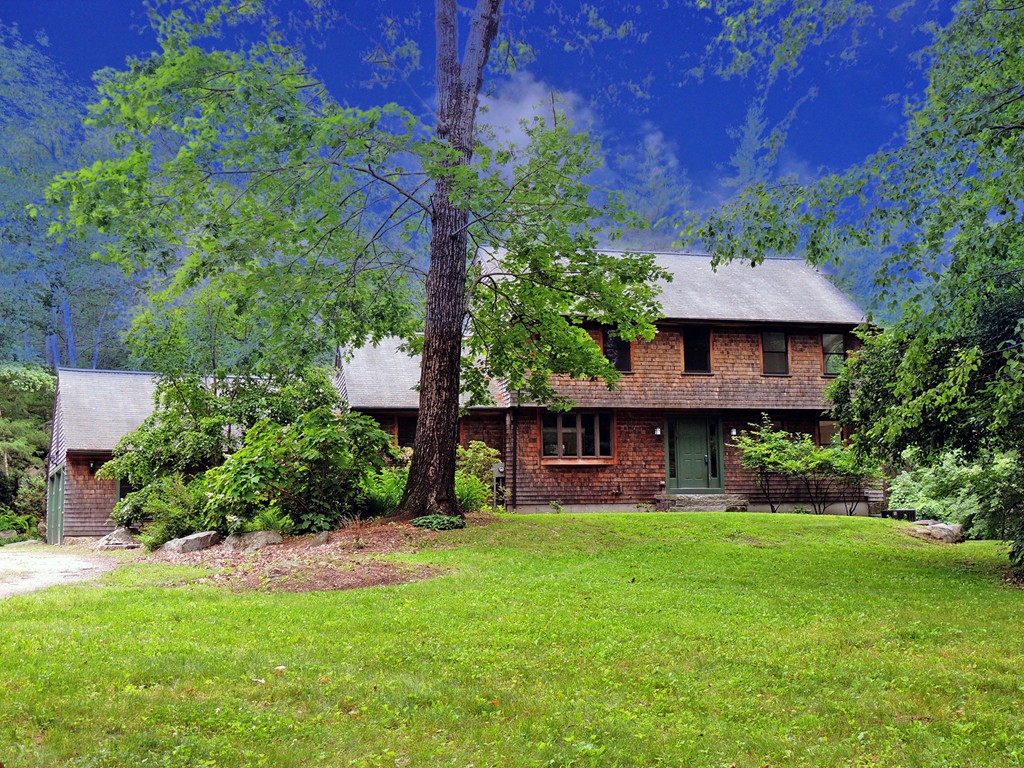 61 Judy Farm Road Carlisle, MA 01741 - Photo 1 of 24 a view of a house with a yard and potted plants
