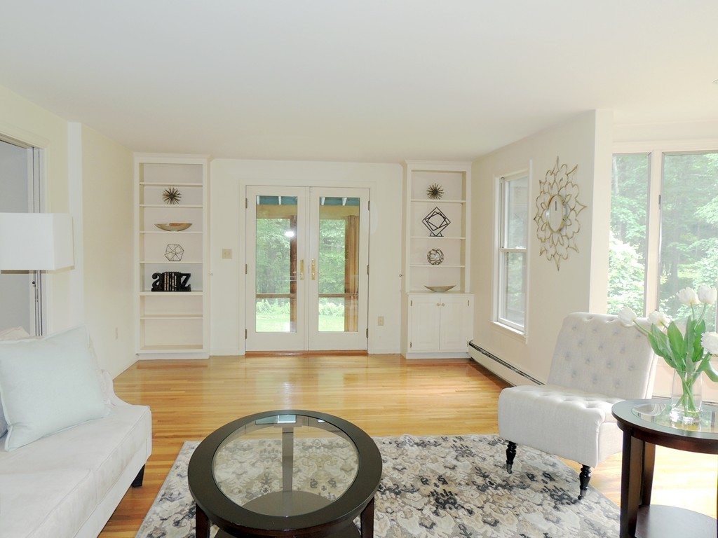 61 Judy Farm Road Carlisle, MA 01741 - Photo 4 of 24 a spacious bathroom with a granite countertop tub sink and mirror