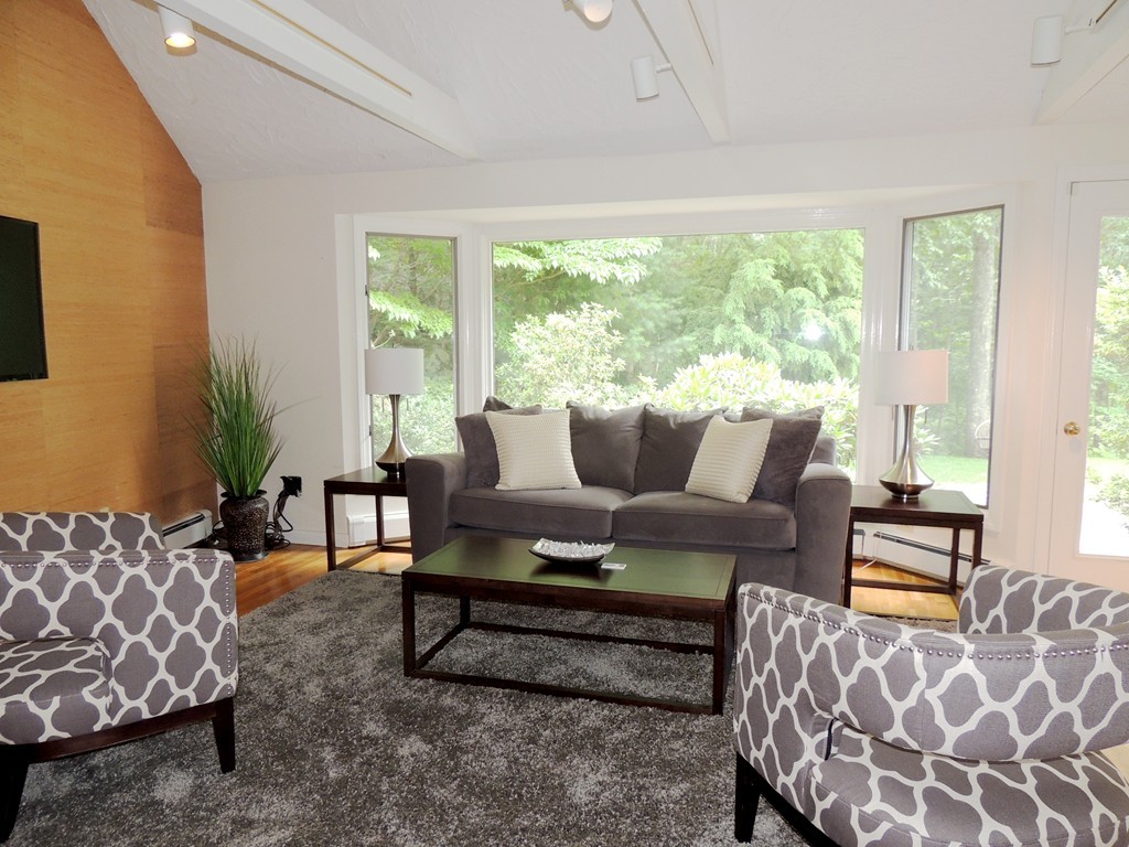 61 Judy Farm Road Carlisle, MA 01741 - Photo 5 of 24 a living room with furniture and a large window