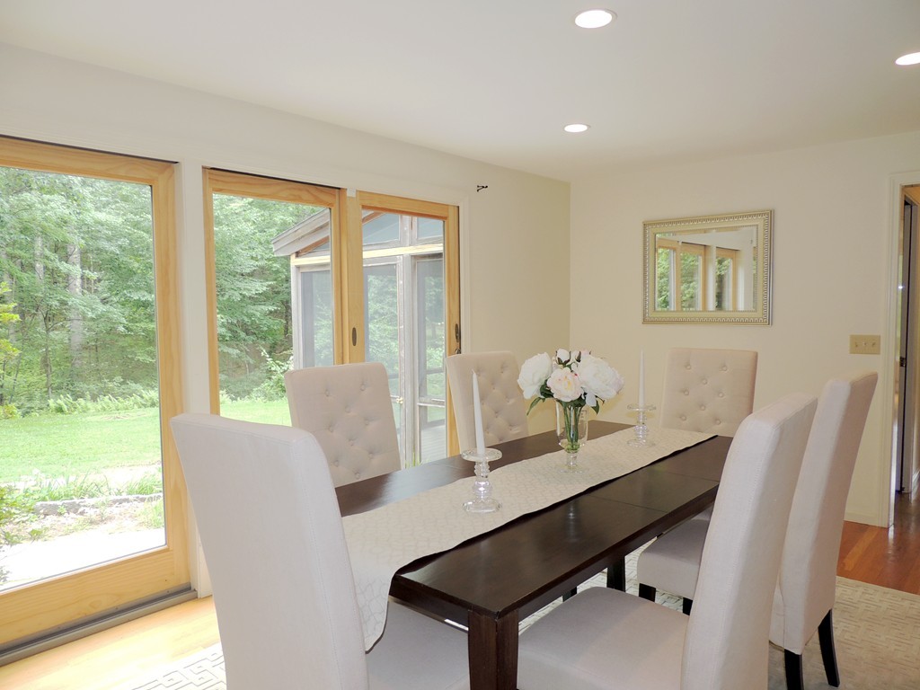 61 Judy Farm Road Carlisle, MA 01741 - Photo 6 of 24 a dining room with furniture and wooden floor