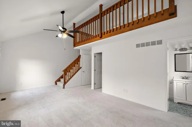 a view of an entryway with a hall