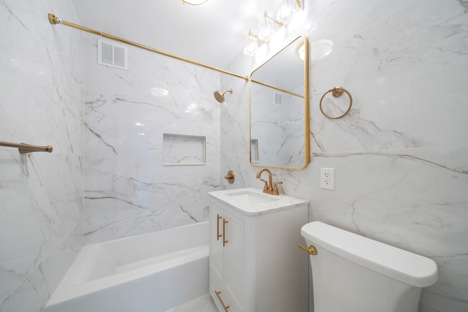 35-20 Leverich Street, Unit A403 Queens, NY 11372 - Photo 10 of 12 a bathroom with a sink a toilet and shower