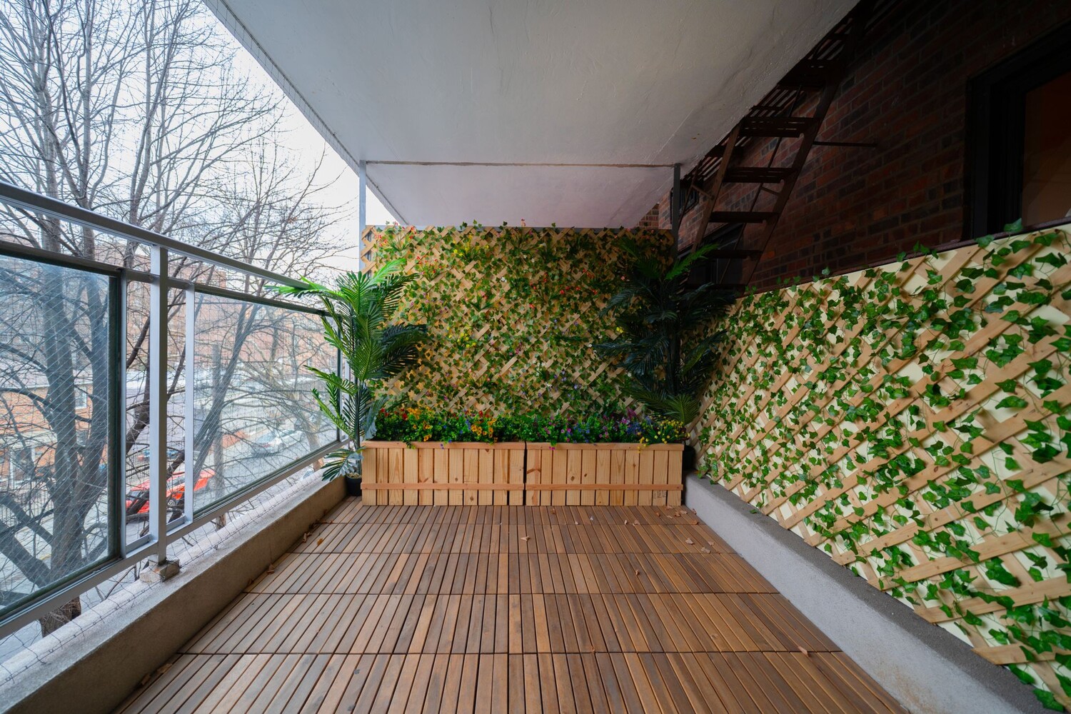 35-20 Leverich Street, Unit A403 Queens, NY 11372 - Photo 11 of 12 a view of balcony with wooden floor