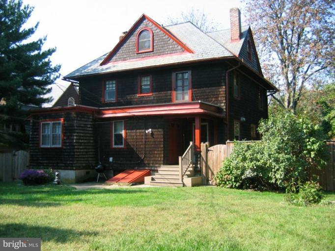 209 Hawthorn Road Baltimore, MD 21210 - Photo 2 of 28 a front view of a house with a yard