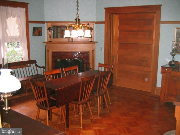 209 Hawthorn Road Baltimore, MD 21210 - Photo 17 of 28 a view of a dining room with furniture and window