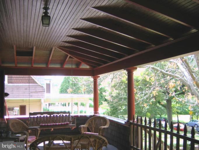 209 Hawthorn Road Baltimore, MD 21210 - Photo 10 of 28 a view of a patio with table and chairs and wooden floor