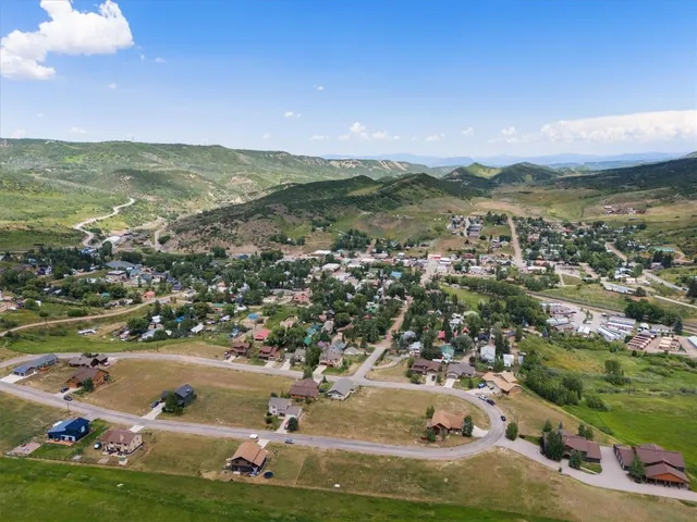 a view of a large lake with a mountain in the background