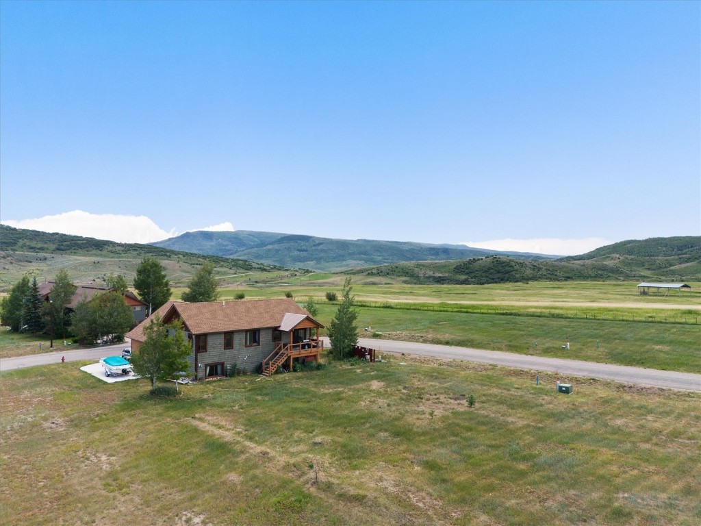 124 Oak Ridge Circle Oak Creek, CO 80467 - Photo 7 of 10 a view of a large lake with a mountain in the background
