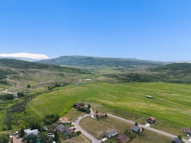 a view of a city with mountains in the background