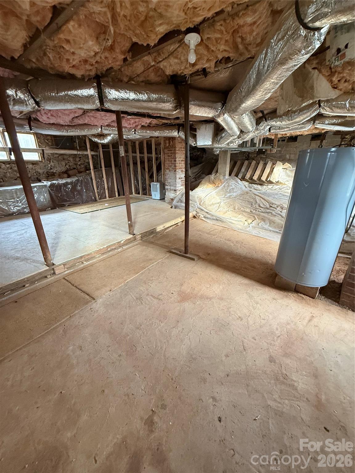 100 Perry Street Marion, NC 28752 - Photo 17 of 20 a view of a garage with wooden floor