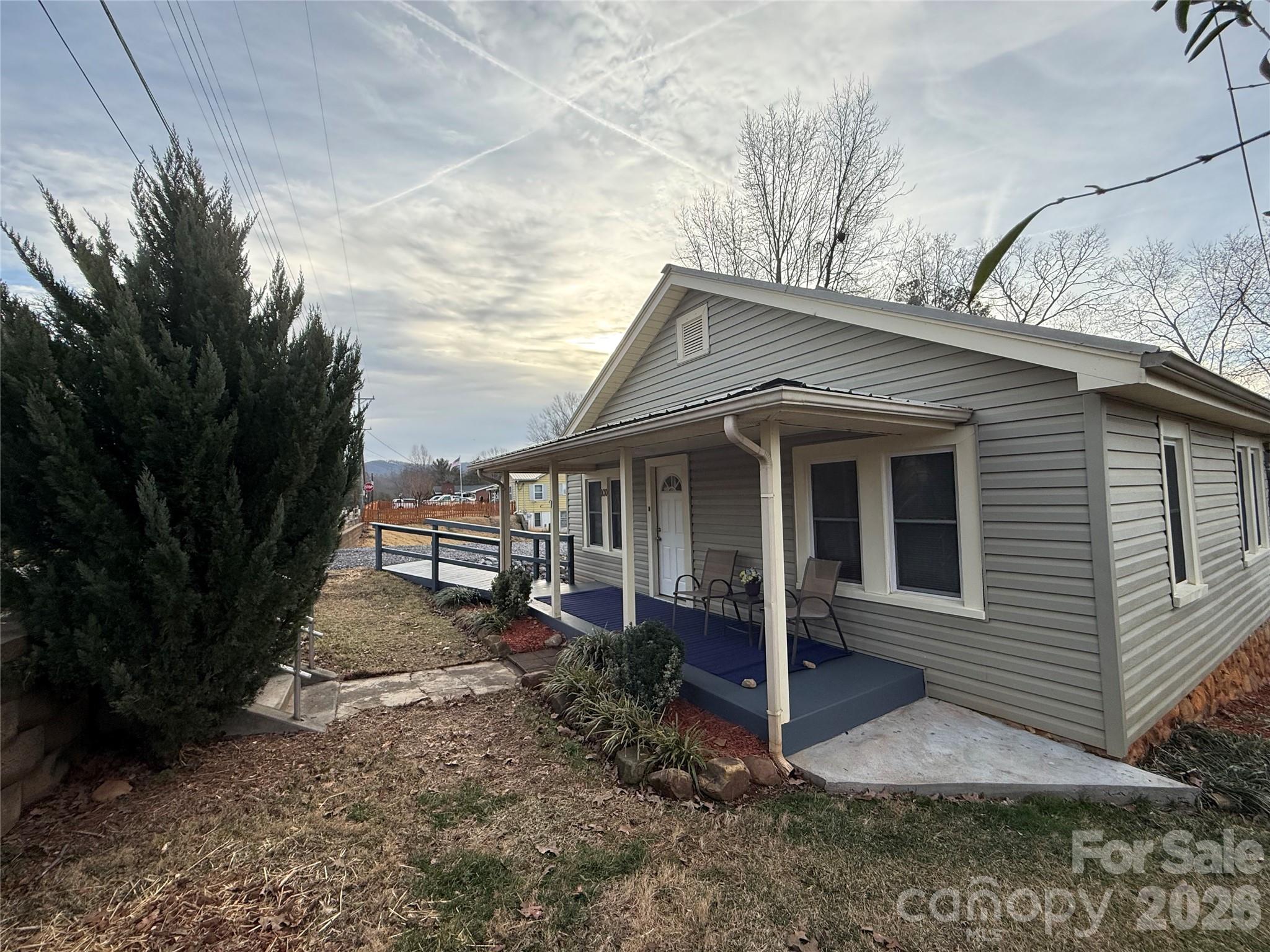 100 Perry Street Marion, NC 28752 - Photo 4 of 20 a view of a house with a yard