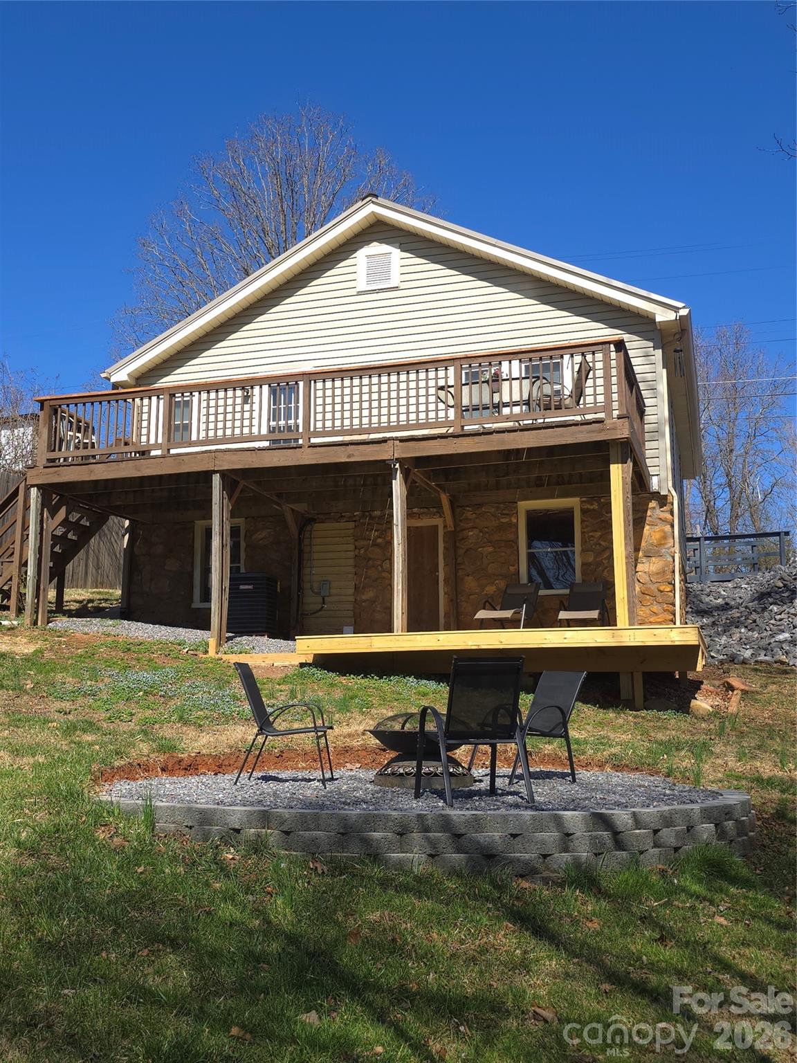 100 Perry Street Marion, NC 28752 - Photo 6 of 20 a front view of a house with swimming pool and porch