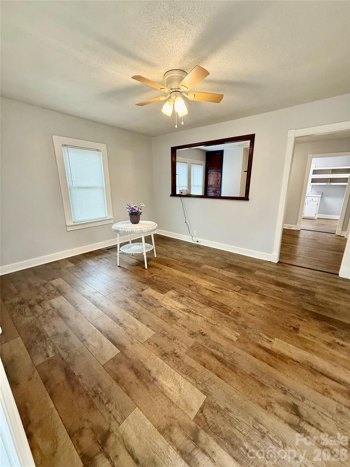 100 Perry Street Marion, NC 28752 - Photo 8 of 20 a living room with furniture and a wooden floor