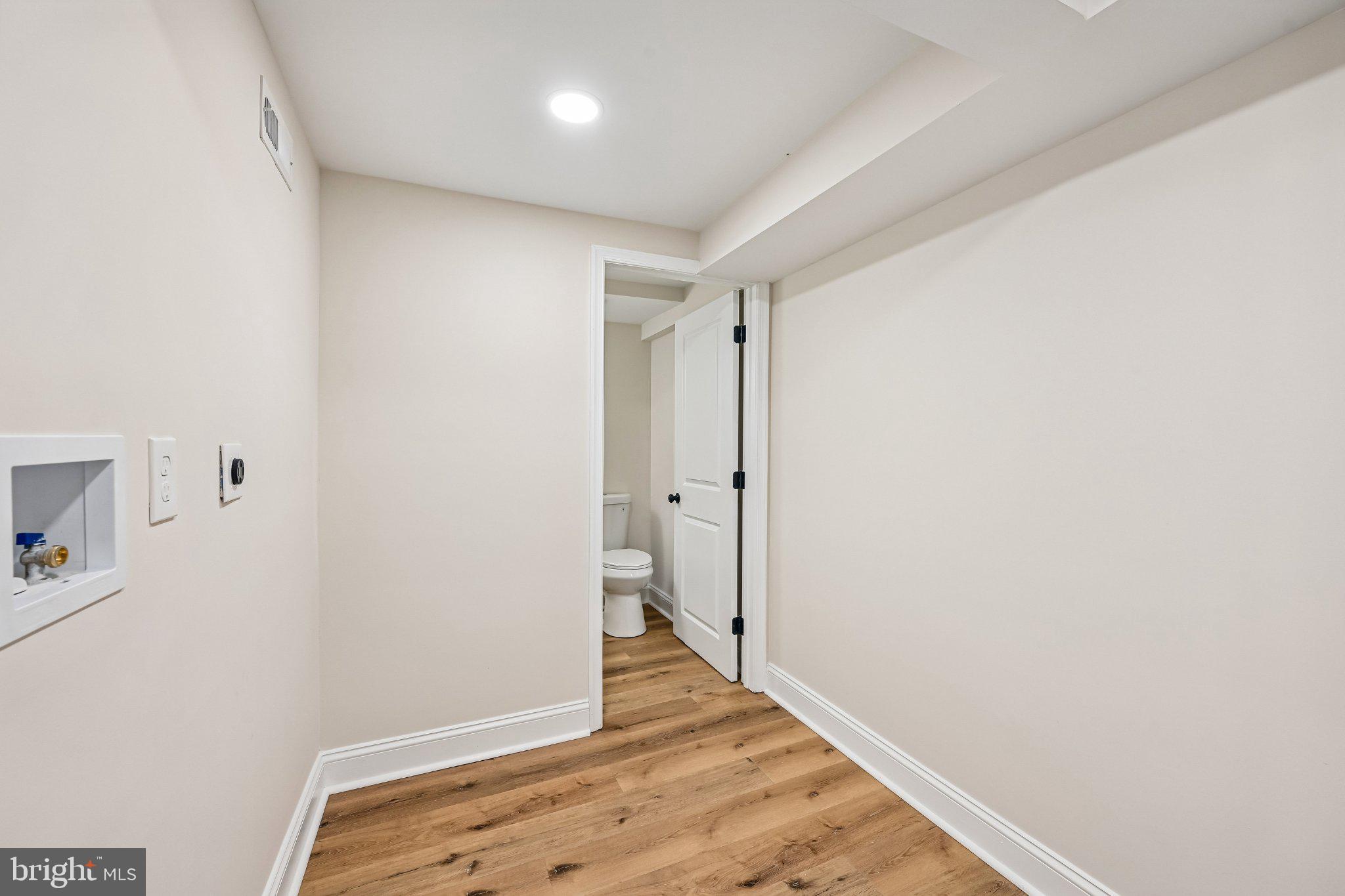 5714 Rusk Avenue Baltimore, MD 21215 - Photo 38 of 51 Bright and airy hallway retreat.