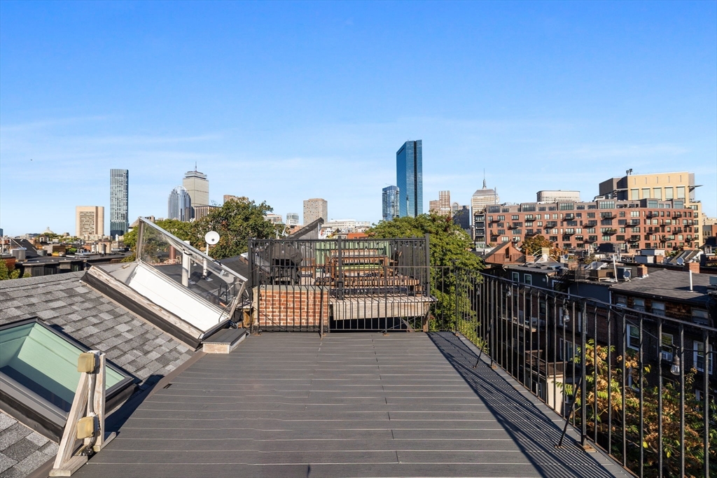 81 Waltham Street, Unit 6 Boston, MA 02118 - Photo 13 of 24 a view of a roof deck with furniture