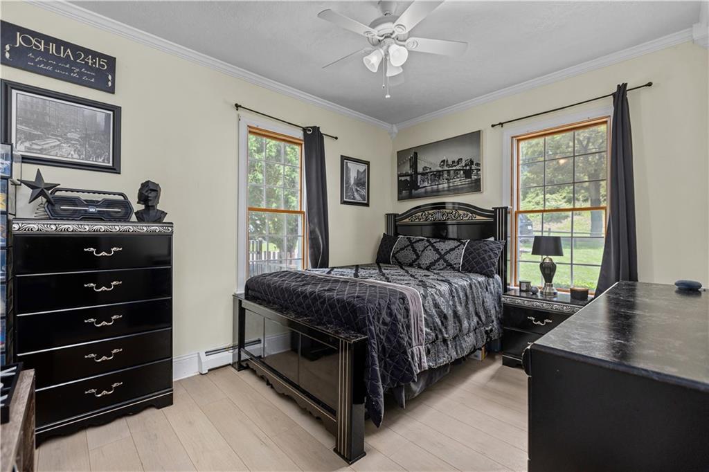 1701 Darlington Road Beaver Falls, PA 15010 - Photo 17 of 30 a bedroom with a bed and a window