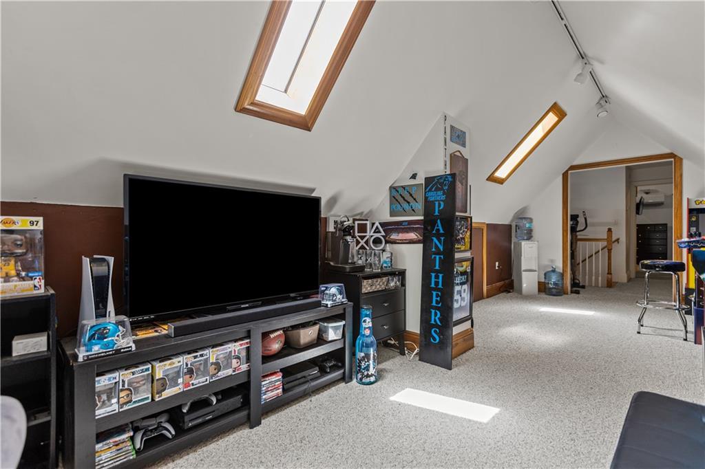 1701 Darlington Road Beaver Falls, PA 15010 - Photo 21 of 30 a room with furniture and a flat screen tv