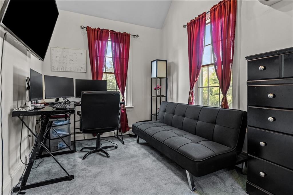 1701 Darlington Road Beaver Falls, PA 15010 - Photo 25 of 30 a living room with furniture a flat screen tv and a window