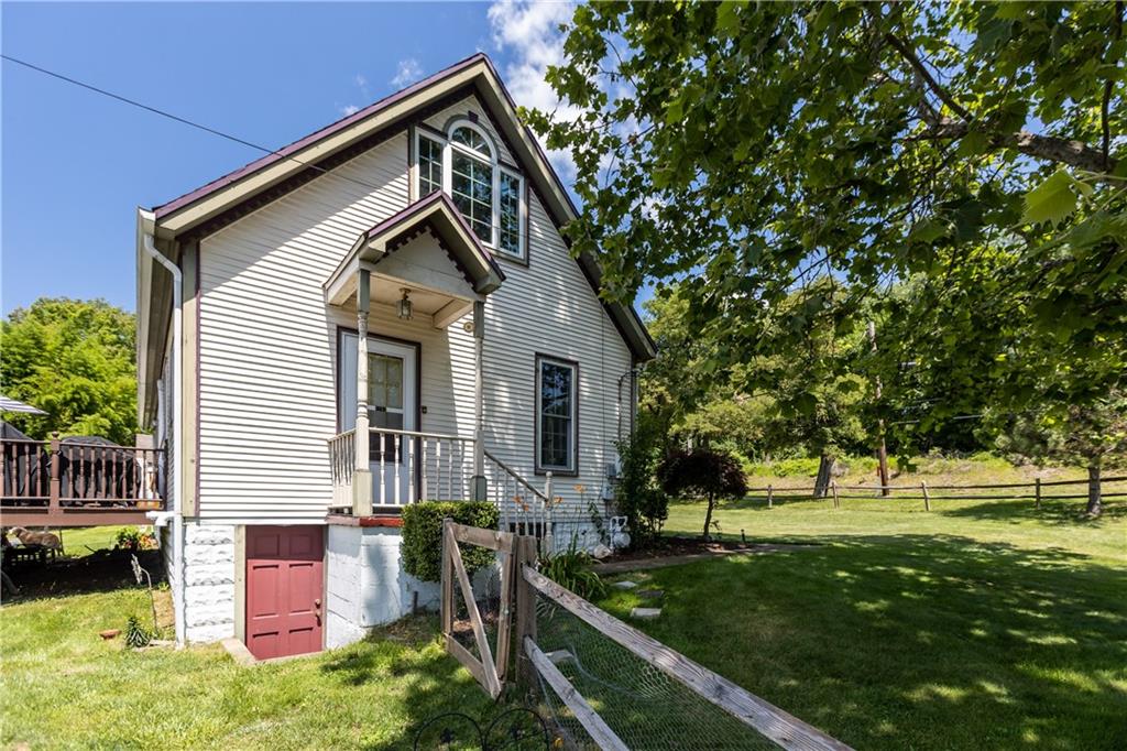 1701 Darlington Road Beaver Falls, PA 15010 - Photo 28 of 30 a front view of a house with a yard