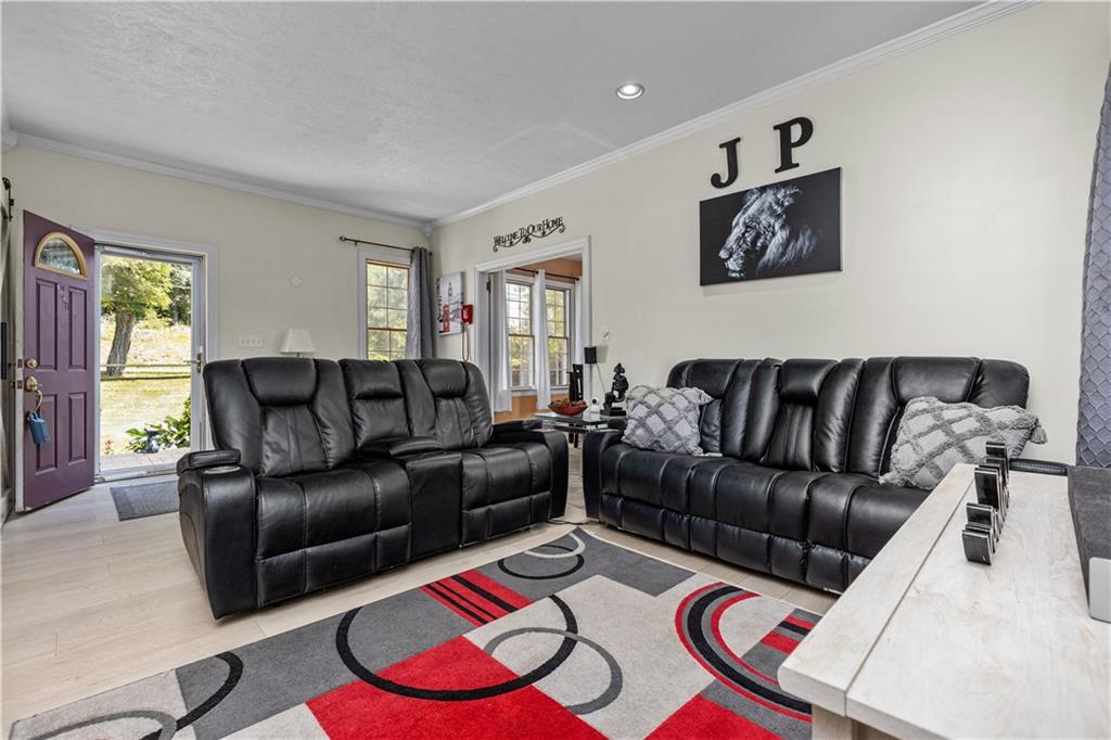 1701 Darlington Road Beaver Falls, PA 15010 - Photo 4 of 30 a living room with furniture and a large window