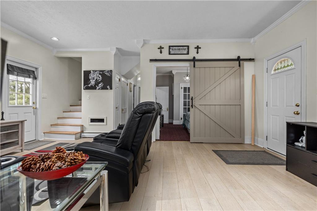 1701 Darlington Road Beaver Falls, PA 15010 - Photo 5 of 30 a living room with furniture and a fireplace