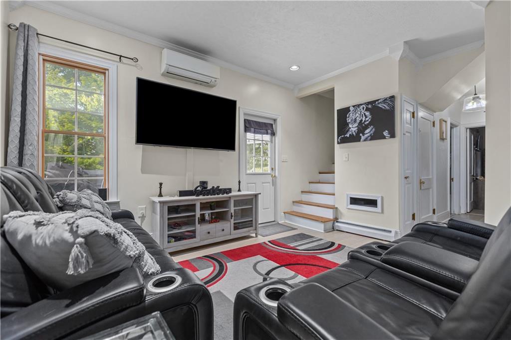 1701 Darlington Road Beaver Falls, PA 15010 - Photo 6 of 30 a bedroom with a bed and a flat screen tv