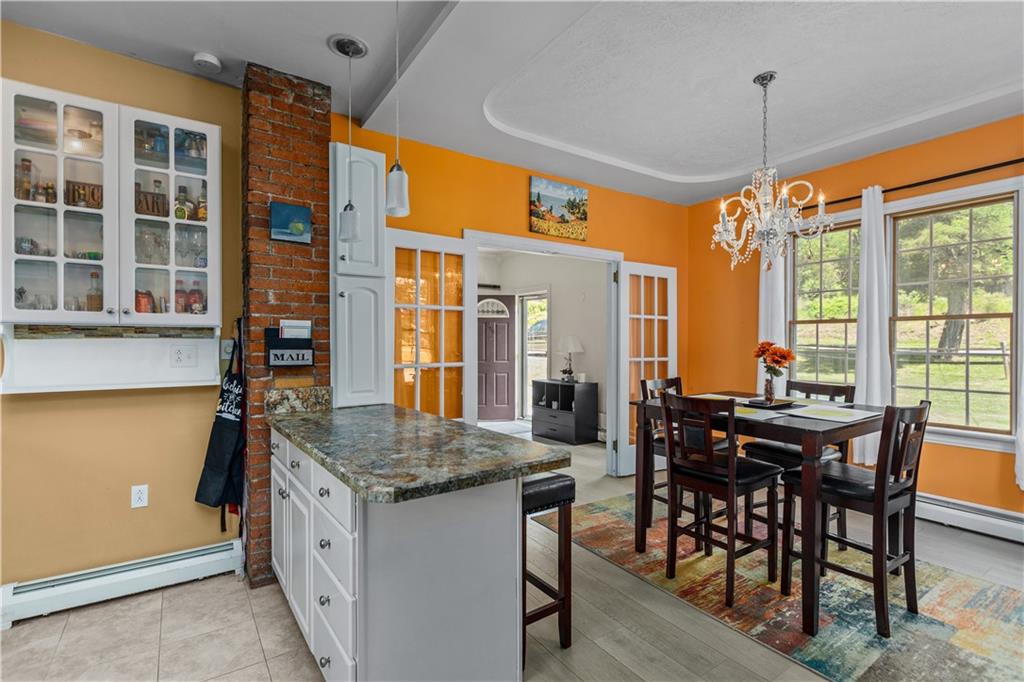 1701 Darlington Road Beaver Falls, PA 15010 - Photo 9 of 30 a view of a dining room with furniture window and outside view