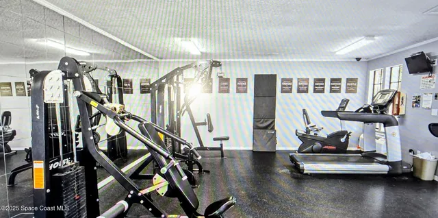 a living room with lots of wooden furniture