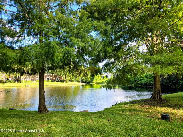 a view of a lake with a big yard