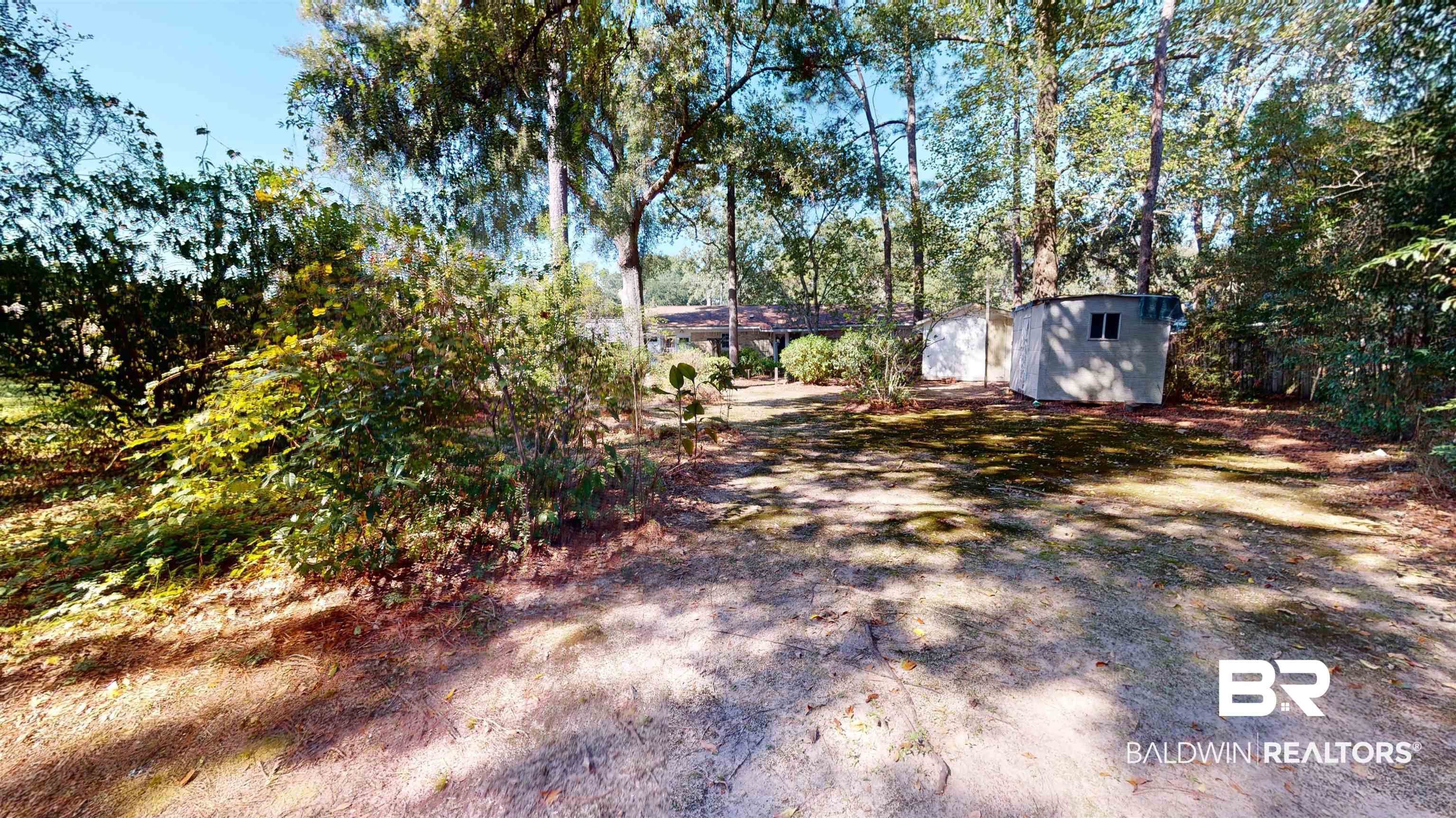 816 Overbey Drive Mobile, AL 36608 - Photo 10 of 27 View of yard featuring a storage shed