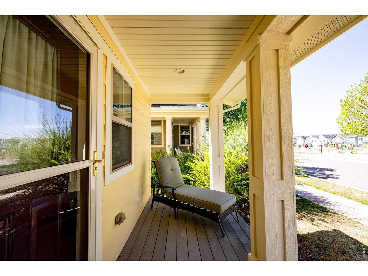1422 Haystack Way Lafayette, CO 80026 - Photo 3 of 33 Relax on your quiet tree lined street and enjoy the views of Longs Peak.