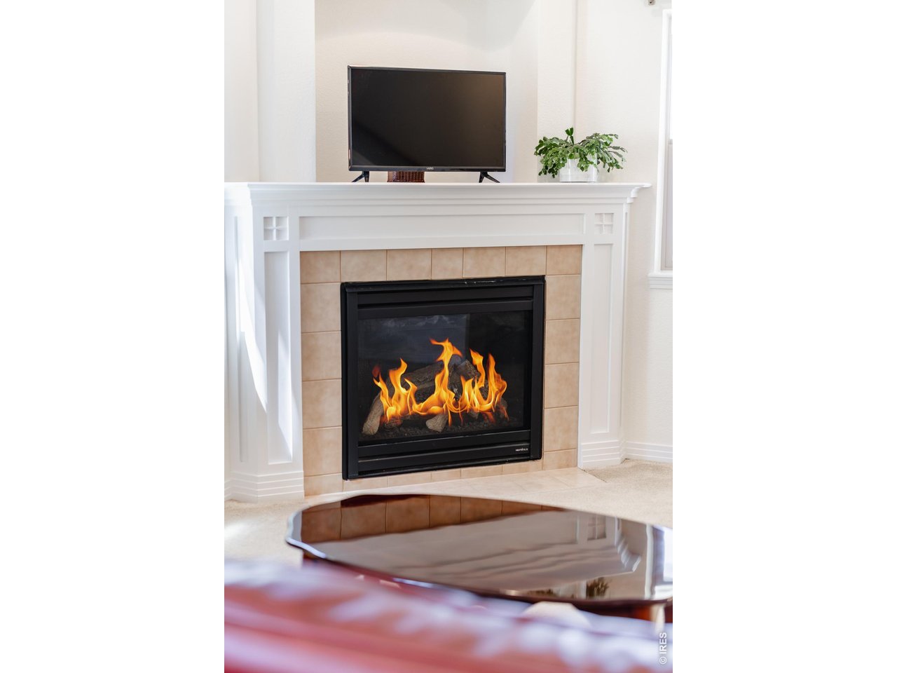 1422 Haystack Way Lafayette, CO 80026 - Photo 5 of 33 Cozy up to the gas fireplace or relax in the sun filled living room.